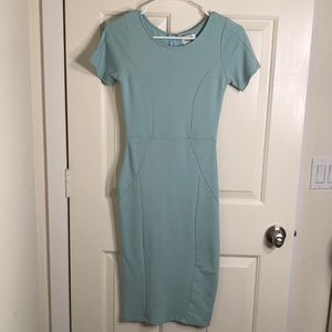 Unique Vintage 1960s style mint wiggle dress